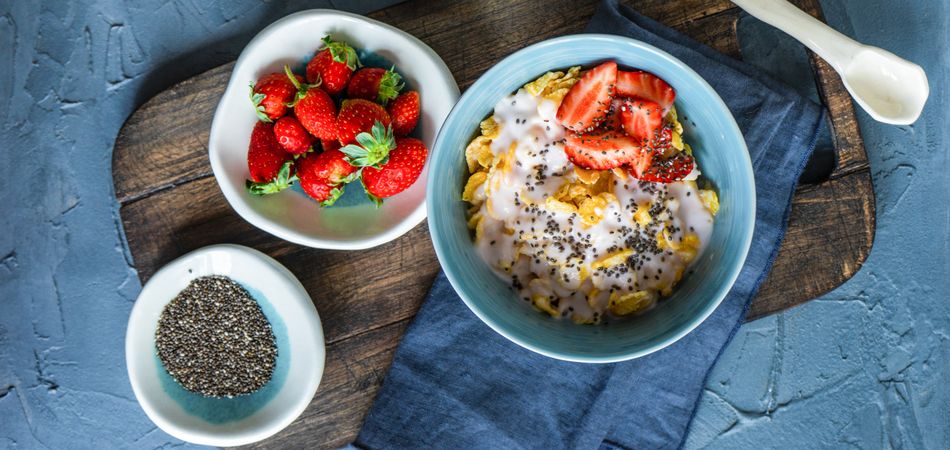 Top view of traditionally healthy breakfast with chia and strawberry