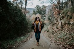 Young female hiking in forest
