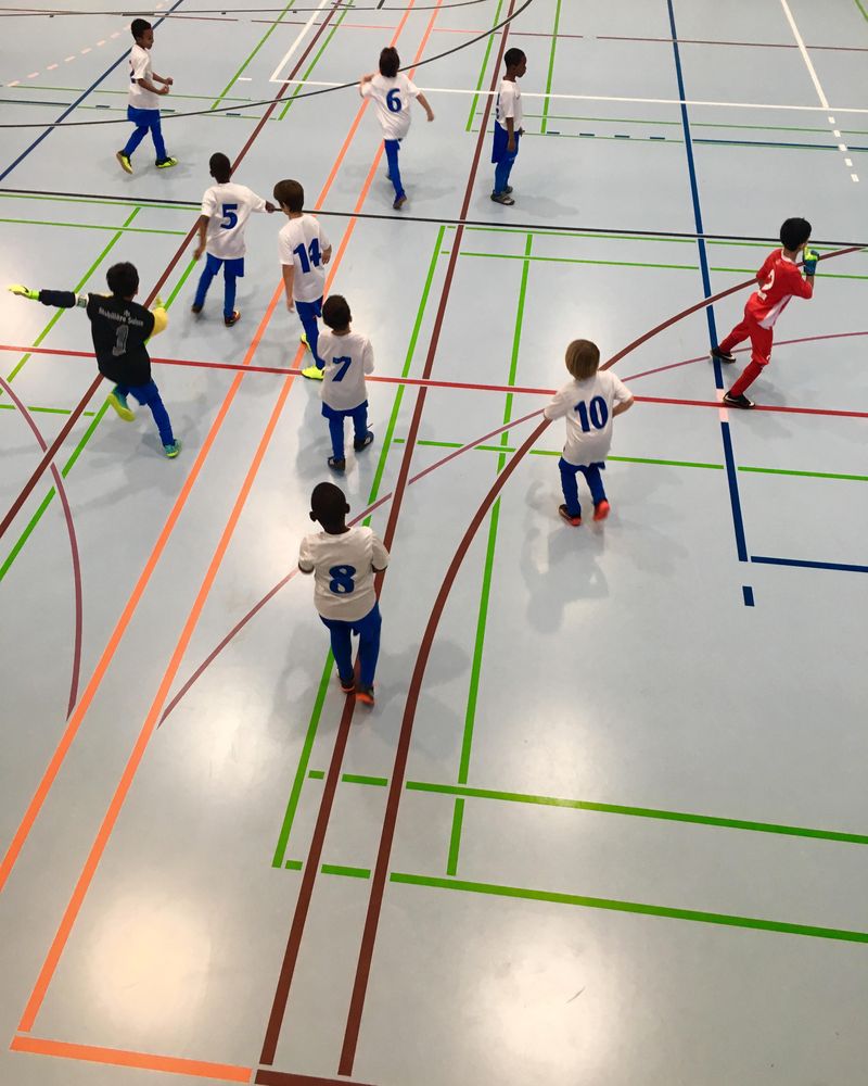 Group of boys playing on field