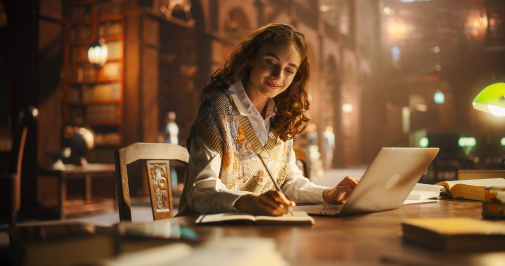 Young Female Student Engaged in Studying with Books and Laptop in a Vintage Library Setting