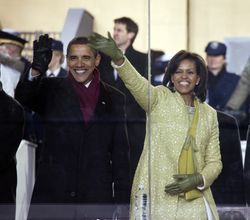 Washington DC, USA --January 24, 2009: Michelle and Barack Obama watch the parade from the viewing stand in front of the White House, Washington, D.C. at the Inaugural Parade. 5kRXRW