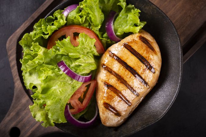 Tasty grilled chicken with salad.