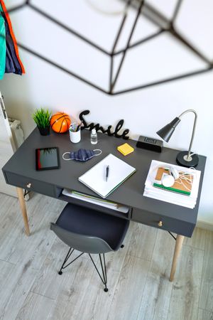 Youth bedroom interior with desk