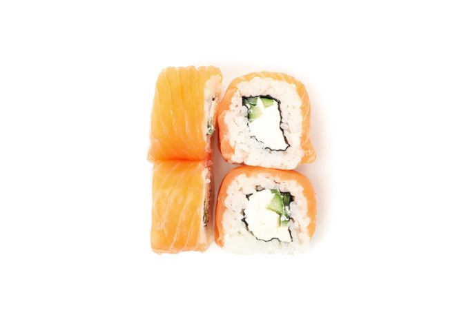 Japanese food. Delicious sushi rolls isolated on light background