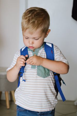 Cute little boy with backpack