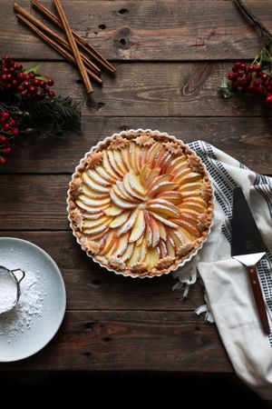 tasty apple pie on a wooden table ready to eat