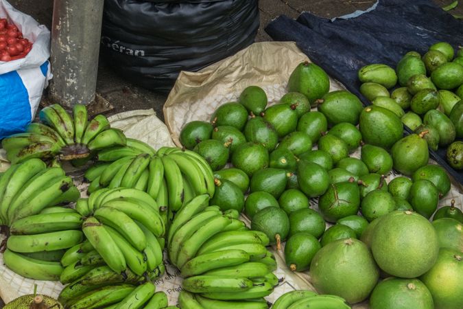 Green bananas, limes and avocado