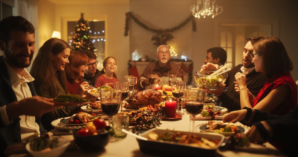 Portrait of a Female Dining Together at a Big Table with Family Members.