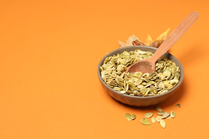 Concept of Autumn vibe food, Pumpkin, Pumpkin seeds, space for text