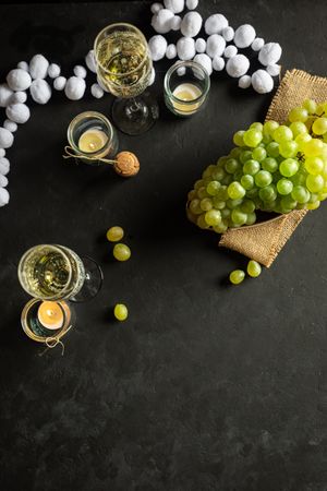 Glasses with wine and grapes