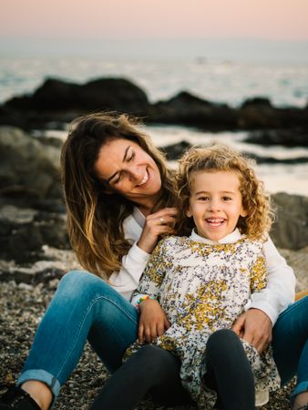 Mother with her daughter at beach