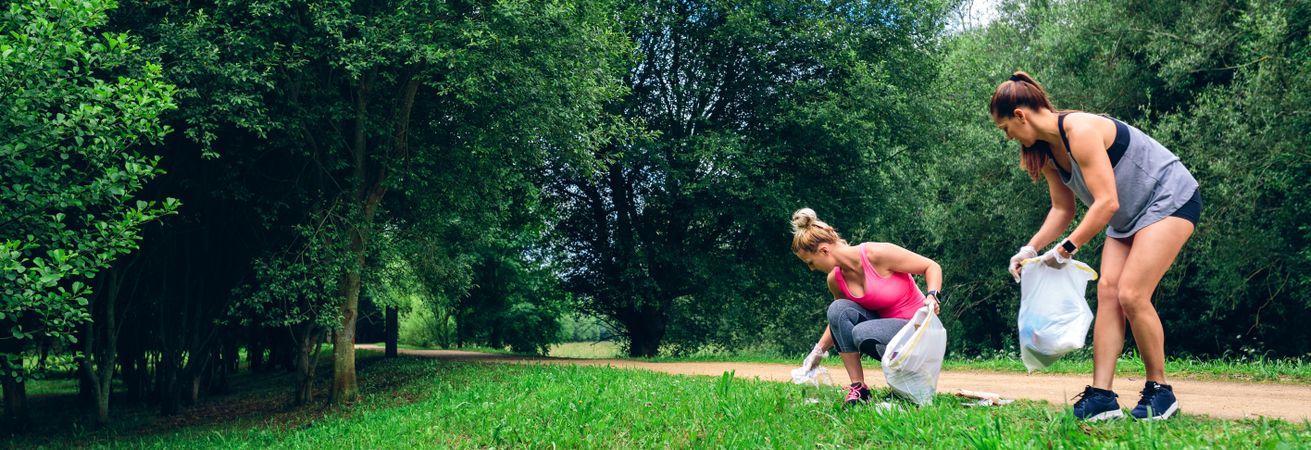 Two woman doing plogging
