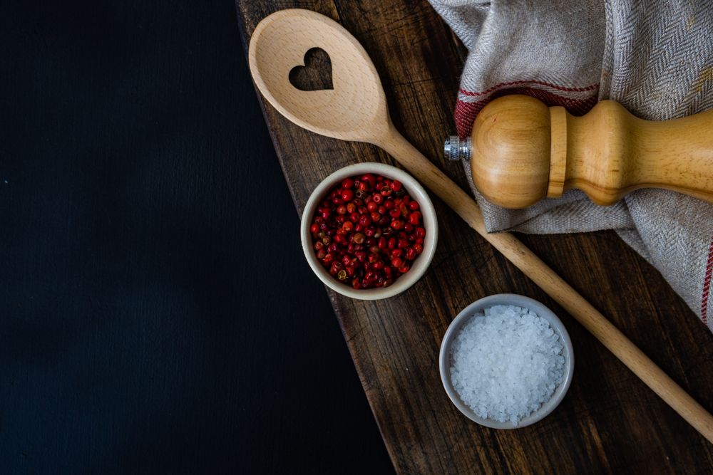 Top view of red peppercorn and salt