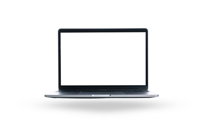 A sleek laptop with an open, blank screen awaits tasks