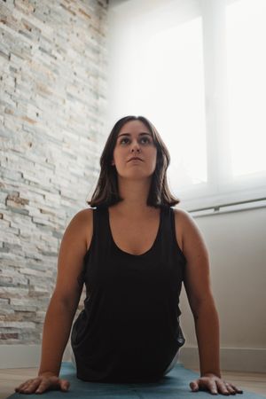 Woman meditating at home