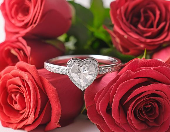 Heart ring and red roses
