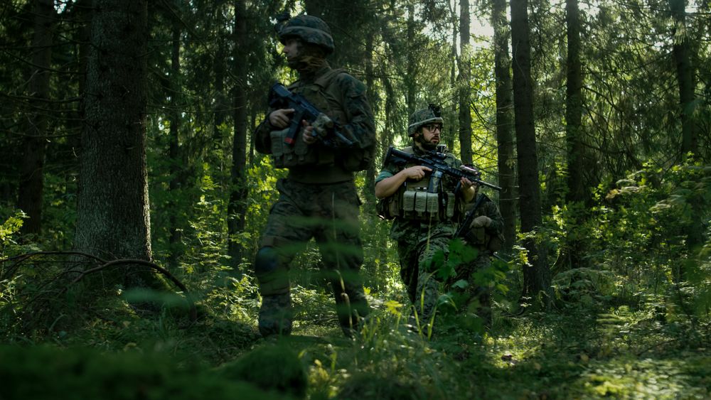 Squad of Five Fully Equipped Soldiers on a Reconnaissance Military Mission.