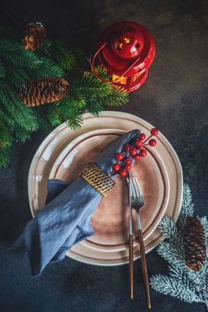 Christmas card concept with plate and holly