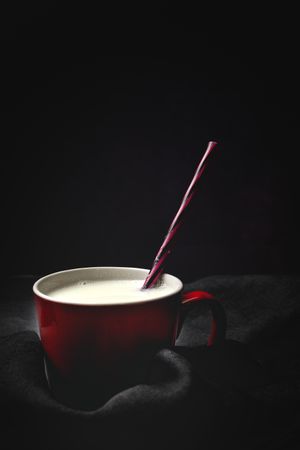 Cup of milk on table