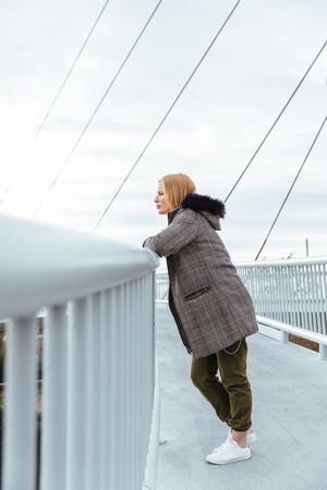Blonde woman posing in the city