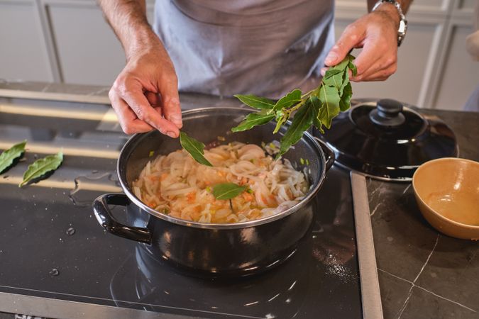 Crop chef in process of cooking