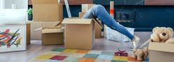 Woman inside a box preparing the move