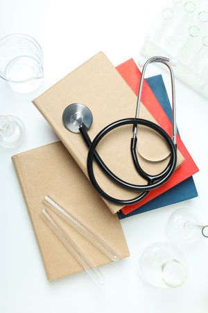 Medical literature - composition with books, top view