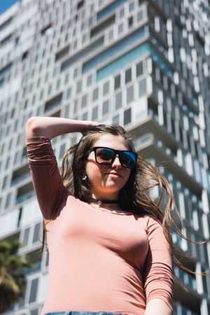 Portrait of 16 year old girl making funny gestures.