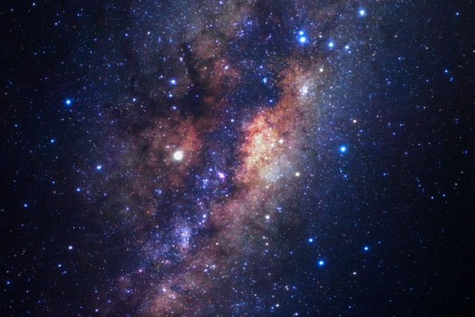 Milky way galaxy with stars and space dust in the universe, Long exposure photograph, with grain.