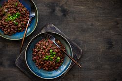 Top view of two bowls of traditional Georgian lobio dish