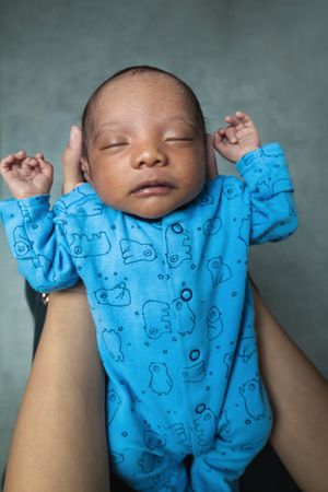 Anonymous mother holding newborn baby