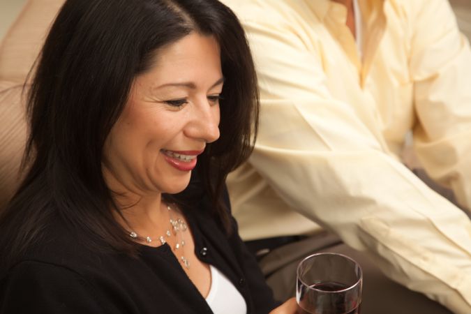 Hispanic Woman Enjoying Wine
