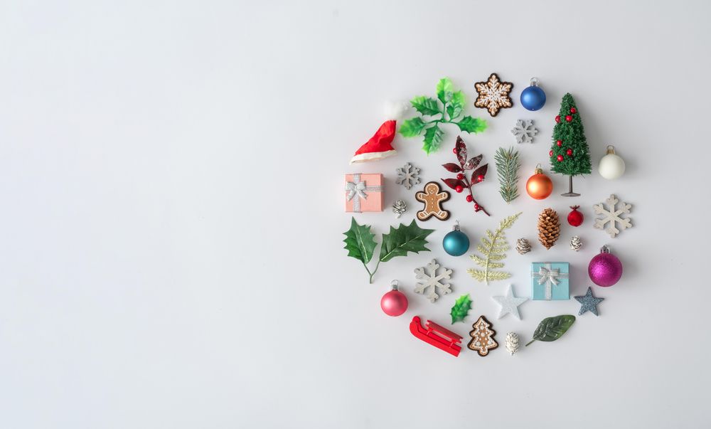Flat lay of Christmas cookies and decorations in circle