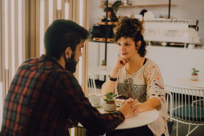 Loving couple having date in coffee shop