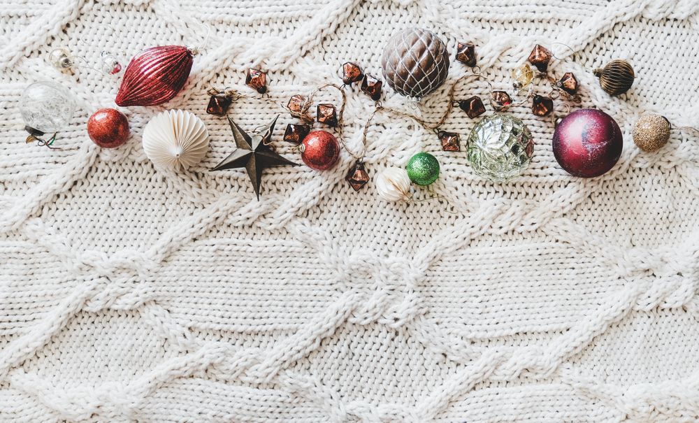 Flat-lay of holiday decorations, top view, copy space