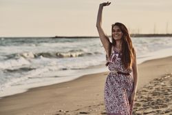 Woman with dress at the beach