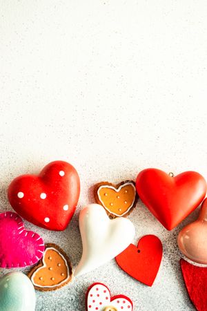Valentine Day holiday card concept with colorful heart ornaments 