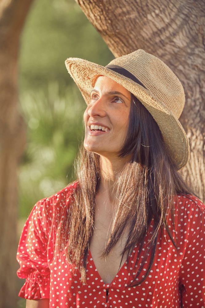 Smiling woman in summer outfit
