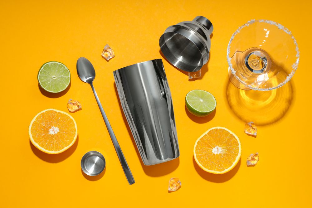 Concept of preparing cocktail, shaker, top view