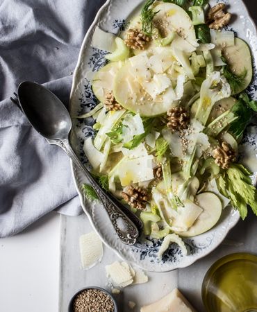 Gourmet salad with fruits, cheese and nuts