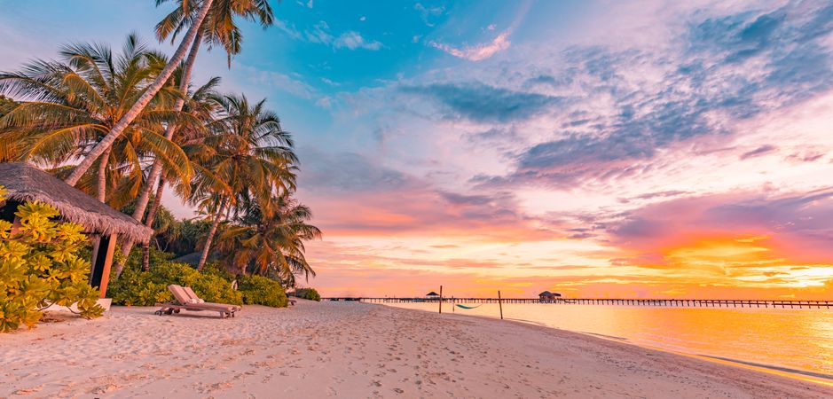Sunset at a beautiful beach in the Maldives, wide