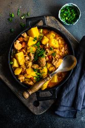 Georgian meat and vegetable dish Souzi served in pot with herb