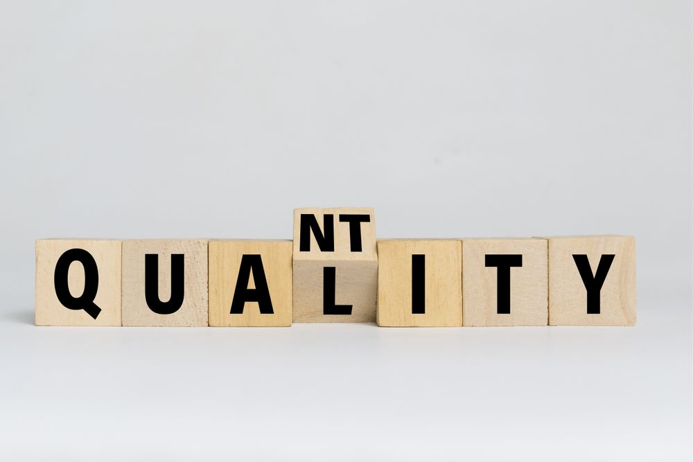 flip wooden blocks with quality and quantity words