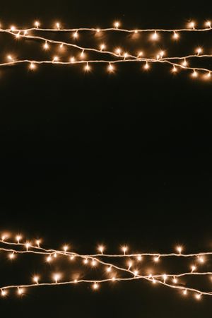 Fairy lights or Christmas lights on dark background