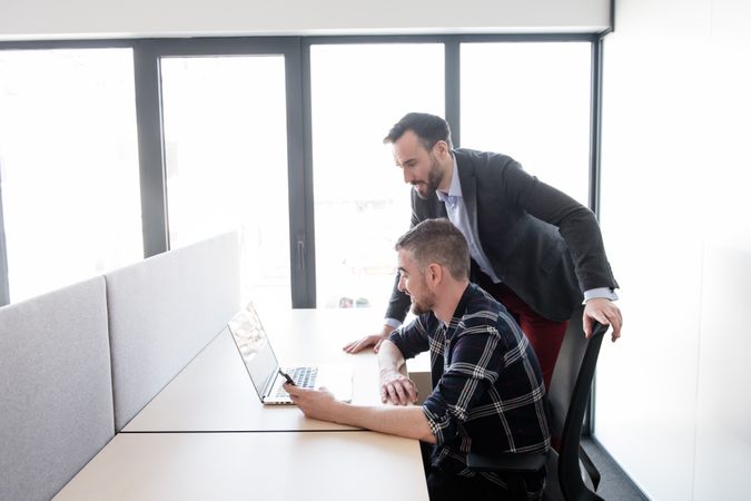 Group of colleagues working in contemporary office
