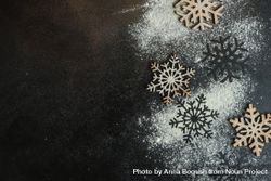 Top view of flour scattered on snowflake shapes 5oGom5