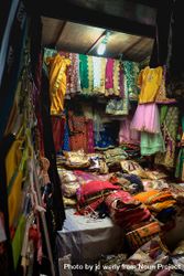 Looking into a fabric stall on a street market 0vm6Bb