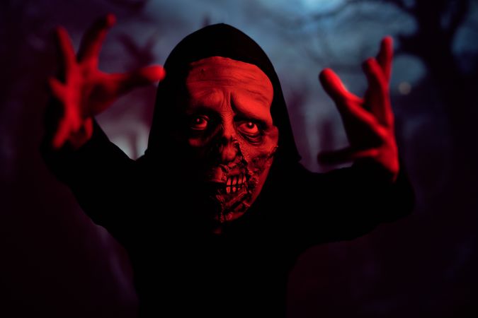 Spooky monster in red neon light