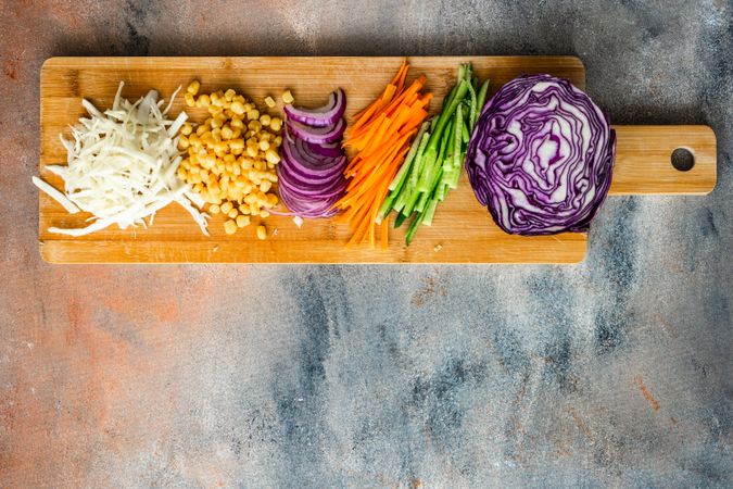 Board of fresh ingredients for salad