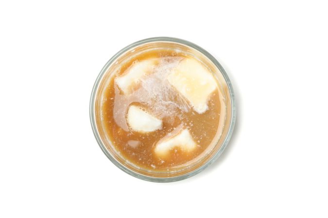 Glass of ice coffee isolated on plain background